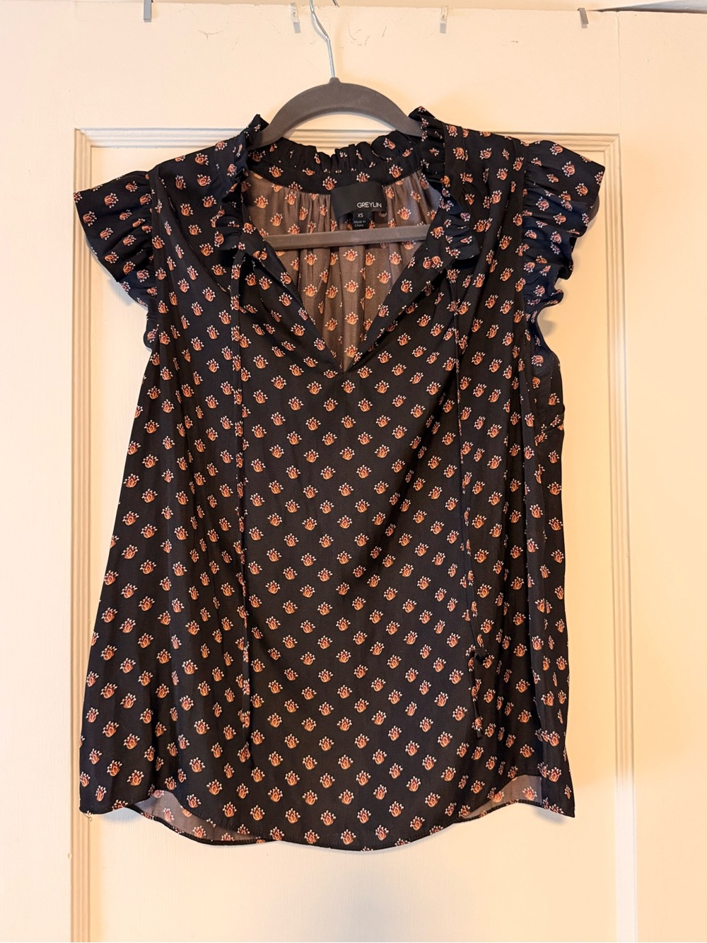 Greylin Navy Blouse with Pink Floral Ruffles